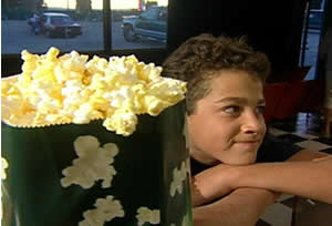 A young patron awaits his ice cold soda.