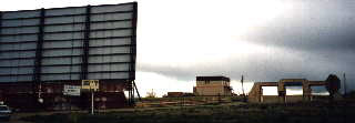 screen and field with cars