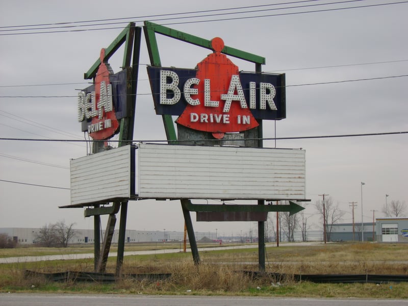The remarkably well-preserved marquee for the Bel-Air Drive-In sits across the street from a Hen House eatery. Nothing remains of the facility, but the lot is for sale!