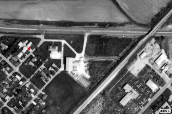 TerraServer image of the former site. Seems replaced by a few buildings and a parking lot. Driveways may be original.