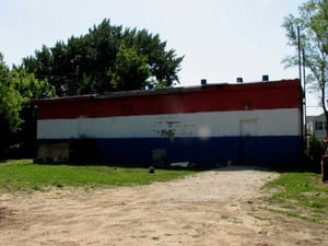 Building still on property behind condos, owned by city of crystal lake.