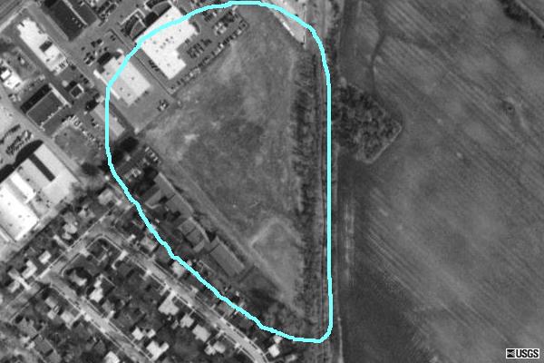 TerraServer image. The drive-in property was inside circle. Drive-in has been completely torn down but property still undeveloped over 25 years after closing.