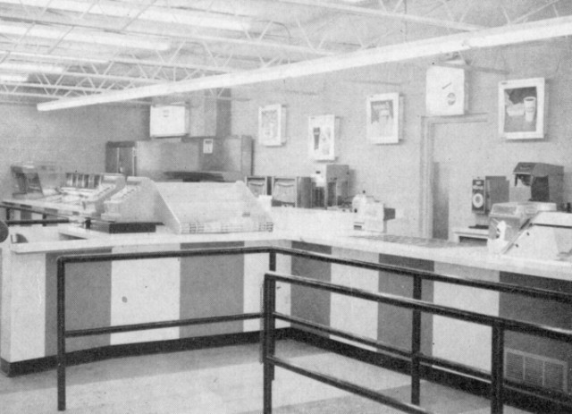 The interior of a new French Village concessions building that was built c.1966.