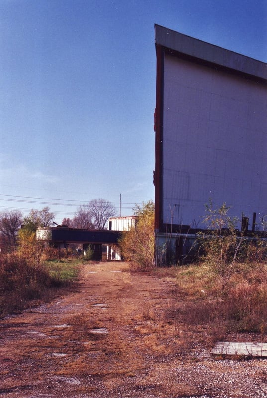 Looking back at the screen and ticket booths