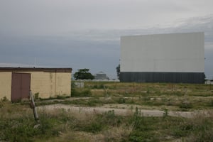 The sun fades on the theater