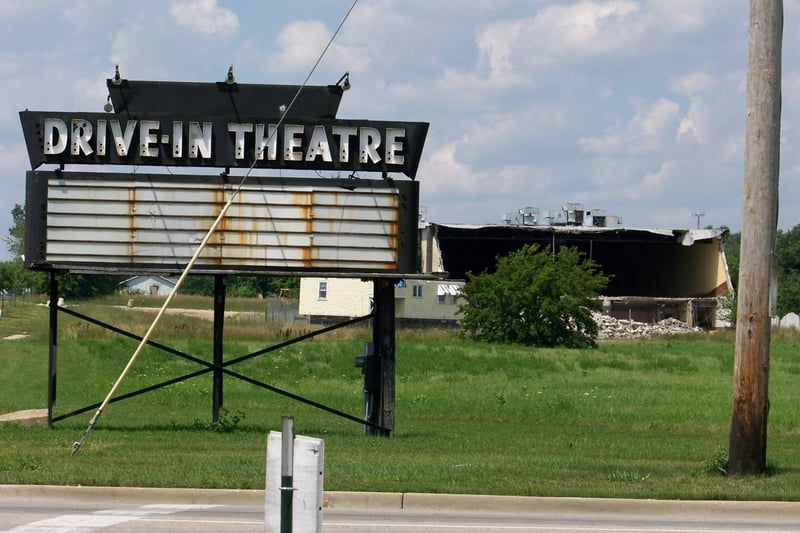 Marquee with indoor theater in background.