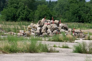 Pile of speaker poles.