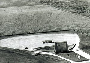 Photo was taken in the late 1950s or early 1960s. The Biehler house was directly across the street out of view in this picture, and Kay Drive-In gave them life time free passes due to the noise and dust. Their House can be seen in the 1998 picture.  I was