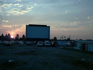 Screen at sunset before movie starts.