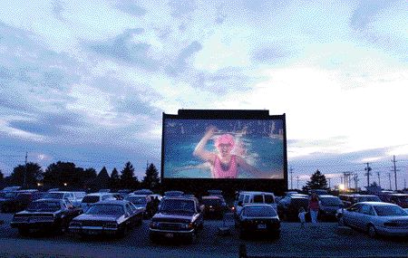 Cars in front of the screen...as seen in the Northwest Herald.