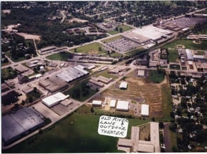 The former site of the theater (at the middle of the picture) from the air.  Parking lanes can still be seen.