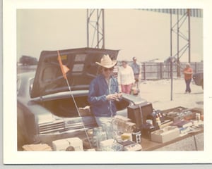 Selling during the flea market heydey at Twin Drive-in.  Note the screen supports in the picture.