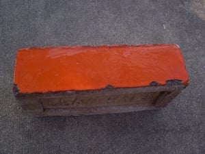 Brick from the Twin drive-in theatre ticket booth after demolition.