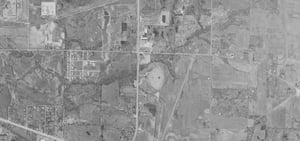 Aerial photo from 1969 showing location of drive-in on east side of Hwy 212 south of Warnke Rd.