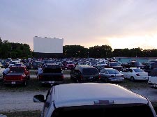 screen, + lot all filled up w/cars (from the 49er Drive-In's website)
