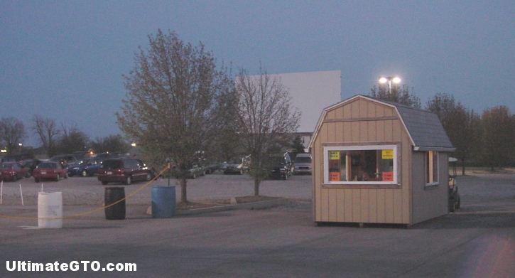 Ticket booth at the entrance to the gravel parking area. Enter here before parking your car in front of the screen.