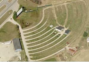 Bird's Eye view from Virtual Earth.  Shows signs of wear and note the building are white with the maintenance building being blue.