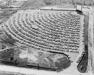 Theater is being used as a holding area for new Studebakers when photo was taken. It was called the Moon Lite at the time. 1954