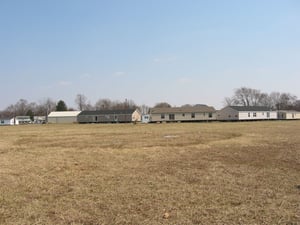 Circular rubble patch where concession building was located.  The buildings were bulldozed a few years ago and buried.