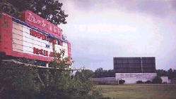 marquee, and fence + screen in distance