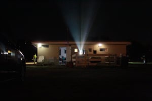 Projection lights from the Huntington Drive-in