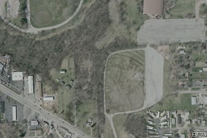 Aerial view of remnants, including foundation of concession building.