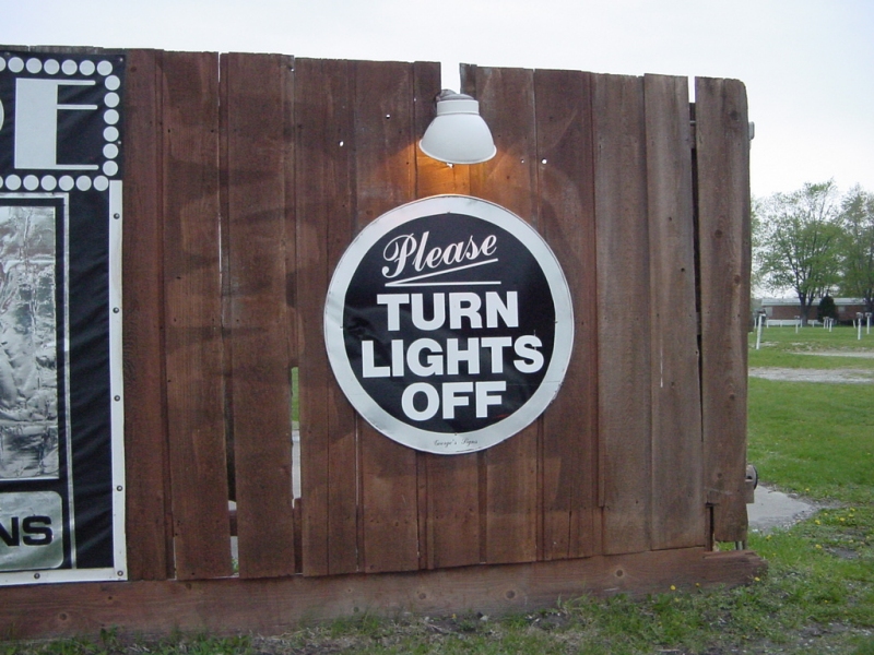 One of the cool signs on the fence at the entrance.  "Please Turn Lights Off"