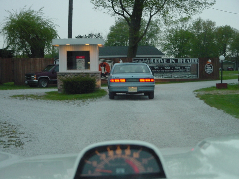 I approach the ticket window in my 1968 GTO hardtop on a darkening Saturday night.