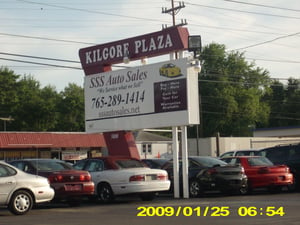 Former sign and marquee of the Muncie Drive-In, now used for proximate businesses.