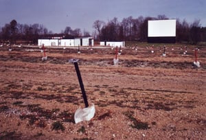 Picture of the field with the 2 buildings