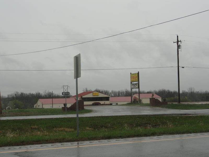 Former site from across US-50. Now Starlight Reception Hall at 10265 US Hwy 50 Aurora