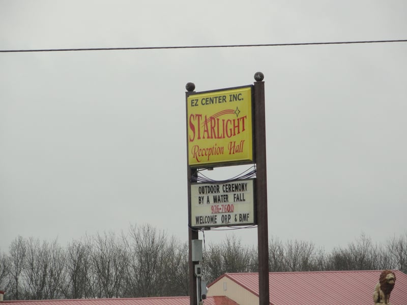 Close up of sign for current business on the site-note the spelling