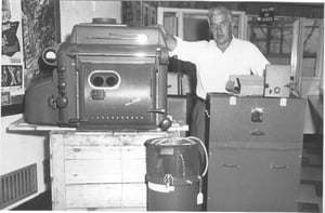 This photo is of Riley Horton (owner) unpacking his new state of the art carbon lamps that lit up the big 90'x50' screen very well.