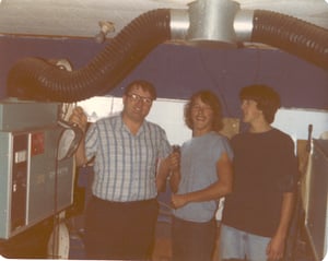 From left to right, Louis Barnwasher of Theater Equipment Sales & Service of Louisville, Riley Horton II owner and Dale Harth projectionist. (1984)