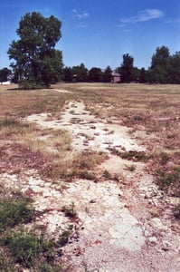 Small patch of remaining concrete paving