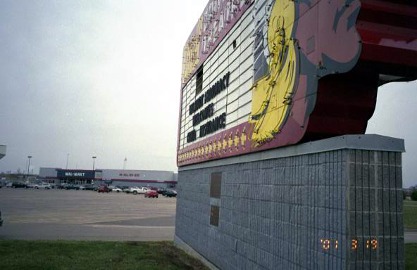 Marquee of the defunct Chief and the Wal-mart that now occupys it's former site.