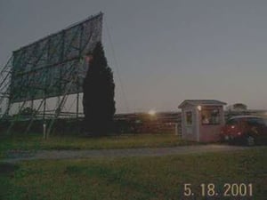 Kanopolis Drive In and ticket booth at dusk