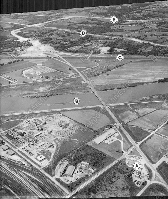 Aerial view taken to show new road construction. Taken from the East. (Cropped version)