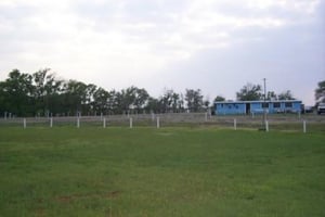 lot and concession stand/projection booth, from in front of the screen