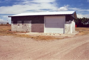 Concession building of simple appearance, probably a converted garage