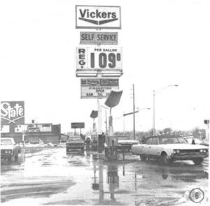 This is from a 1980 Wyandotte High School yearbook. The picture was taken to show the high price of gas then. They just happened to get State drive-in in the background.