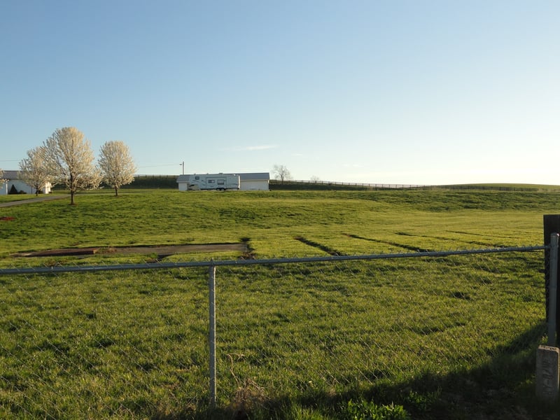 looking up the hill past the screen foundation remnants toward the projectionconcession building