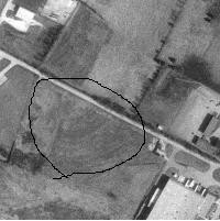 The area in the circle is what was left of the drive in as of 1993. the building in front of it is a factory building