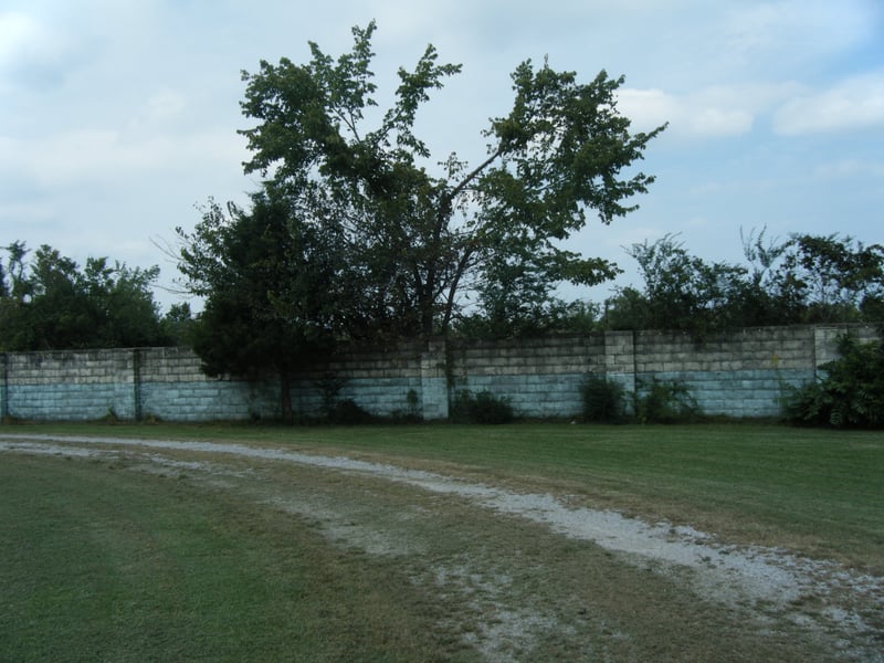 entrance road and stone fence