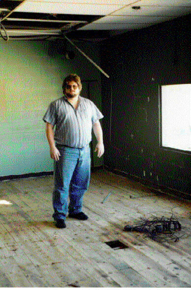 projectionist Tim Reed in the stripped projection booth