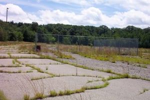 Side view of rear of lot.  Some fenced in portion in the rear.  No apparent reason why.