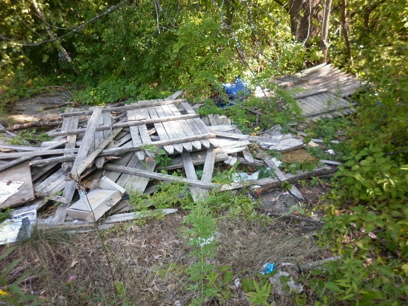 Discarded pieces of perimeter fence