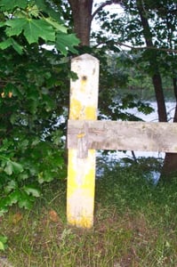 old perimeter fence post
