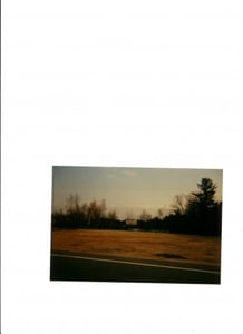 Pic from the road, across the pond, and to the screen