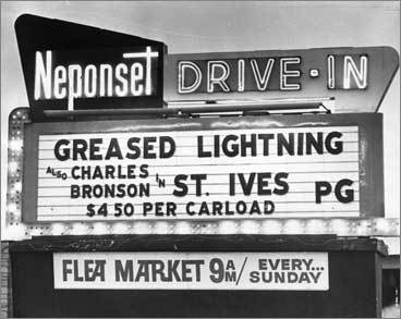Black and white photo of the Neponset Drive-In marquee.